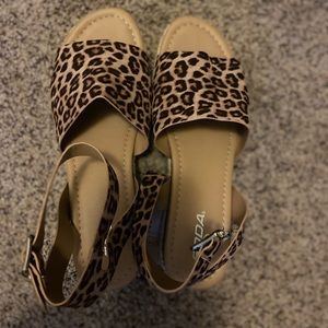 Size 10 cheetah print sandal. Never worn